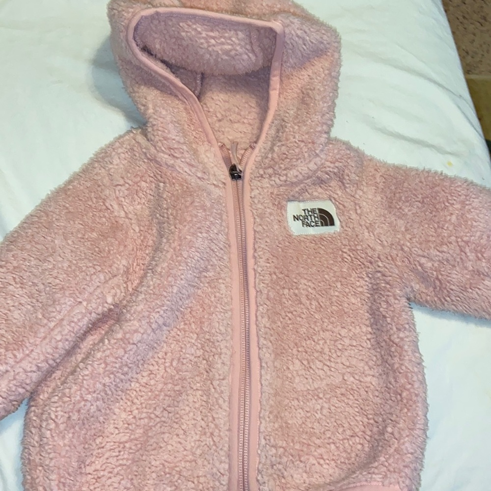 Used Pink NorthFace infant jacket. 6-12 months